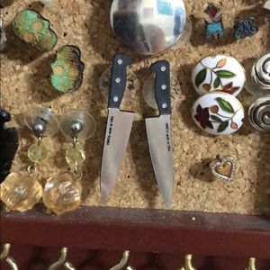 Knife stud earrings.